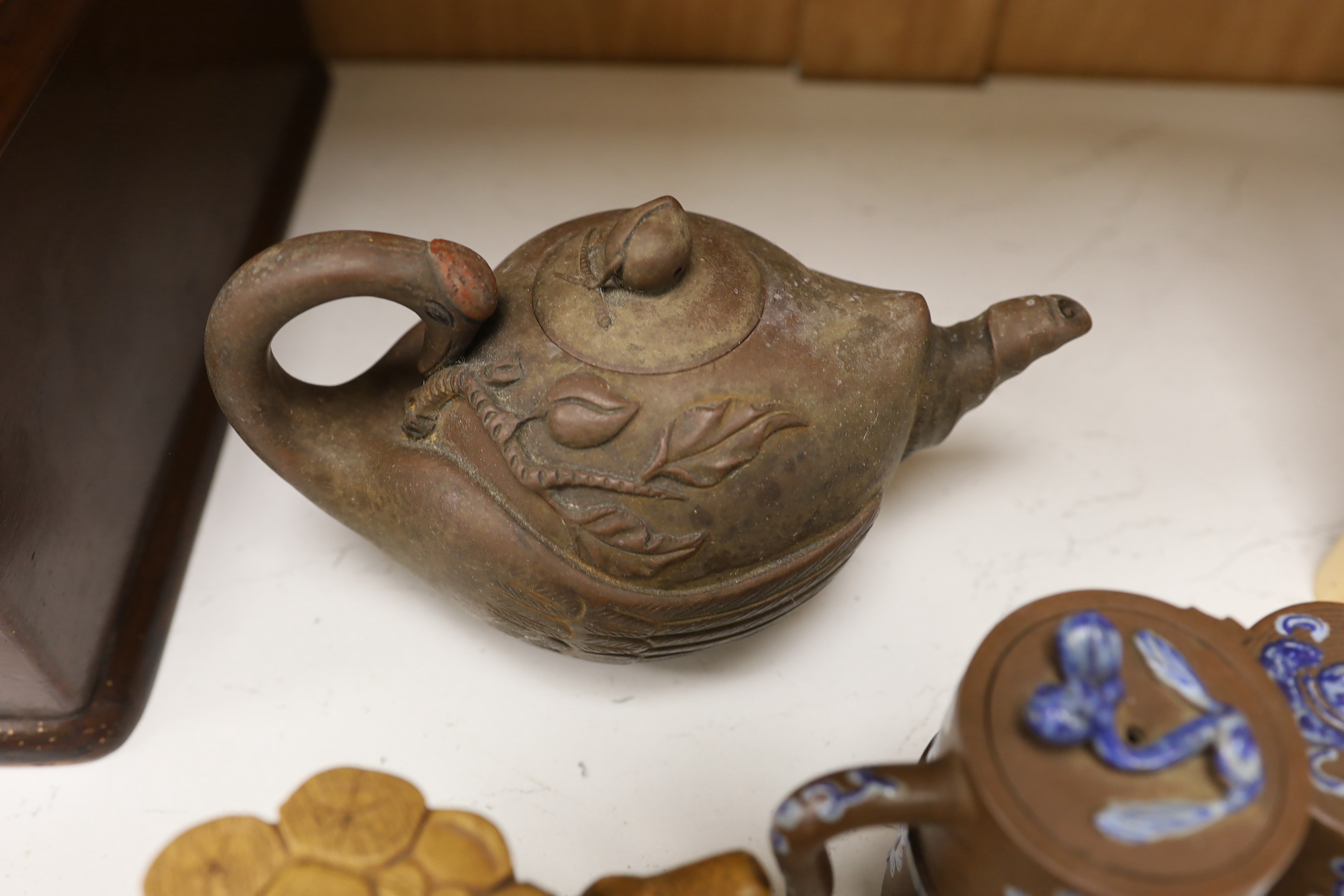 Four Chinese Yixing teapots and a Japanese sharkskin glazed teapot. Provenance - from a collection of Yixing pottery bought in 1990s and early 2000s.